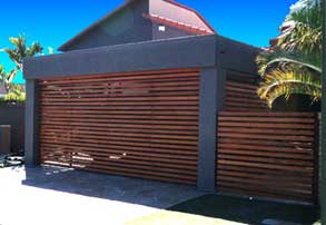 Stylish slatted cedar door and fencing