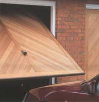 Tilting garage door