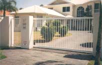 Sliding gate and matching pedestrian gate